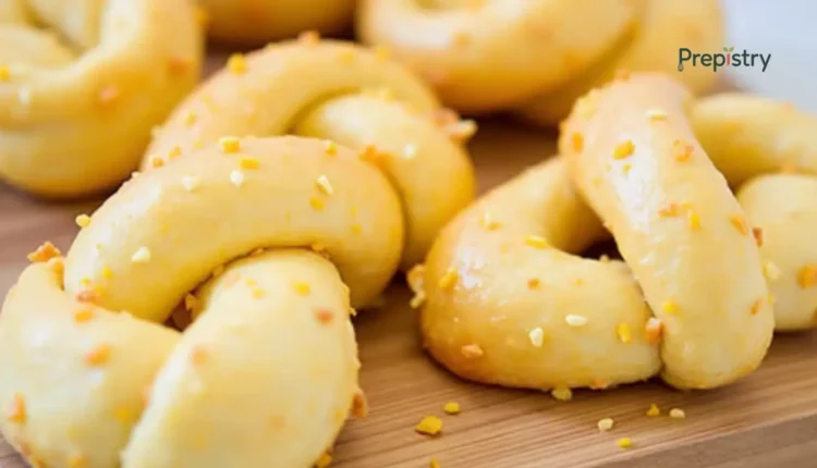 Close-up of soft, twisted breakfast knots with zest